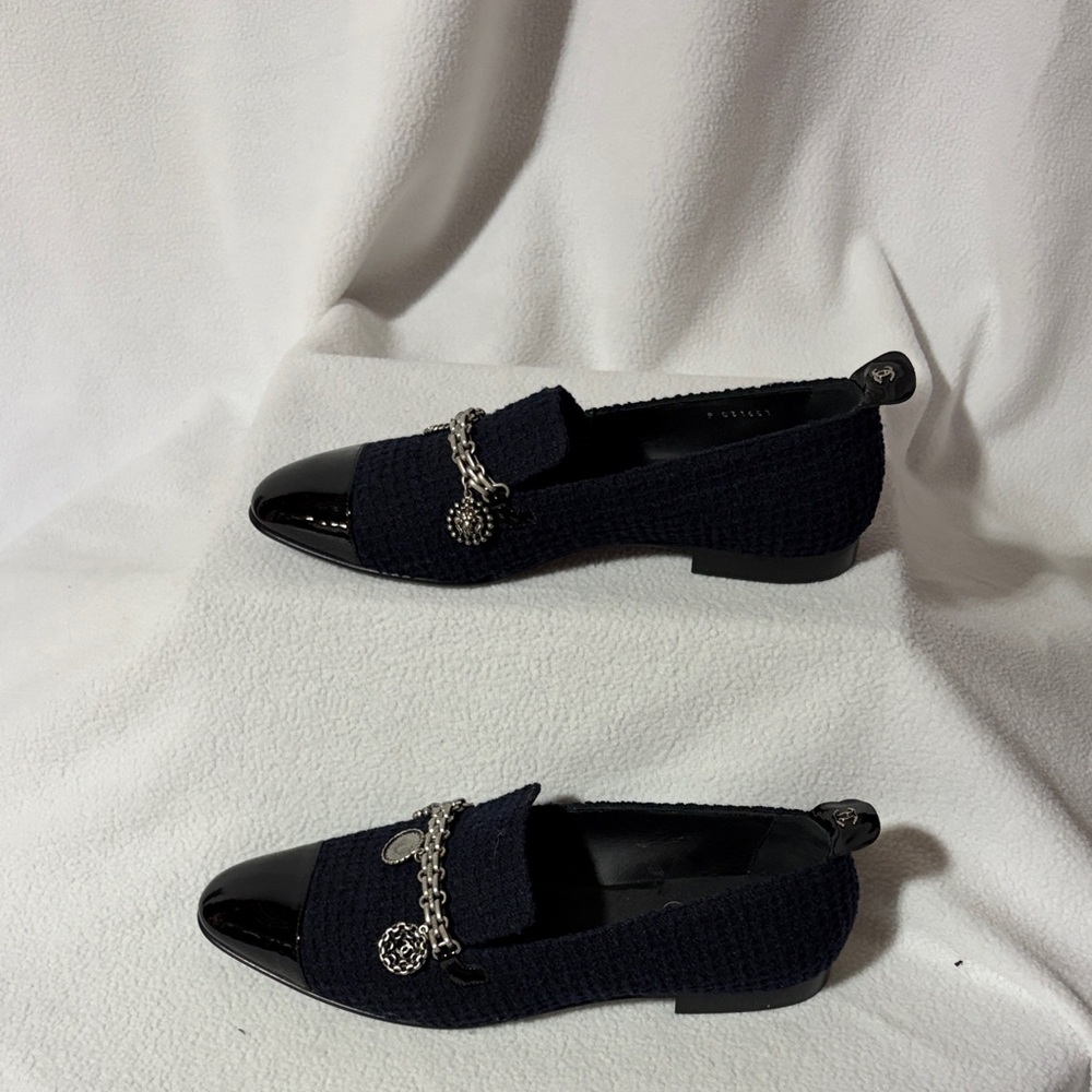 CHANEL Navy Loafers with Silver Chain Accent
